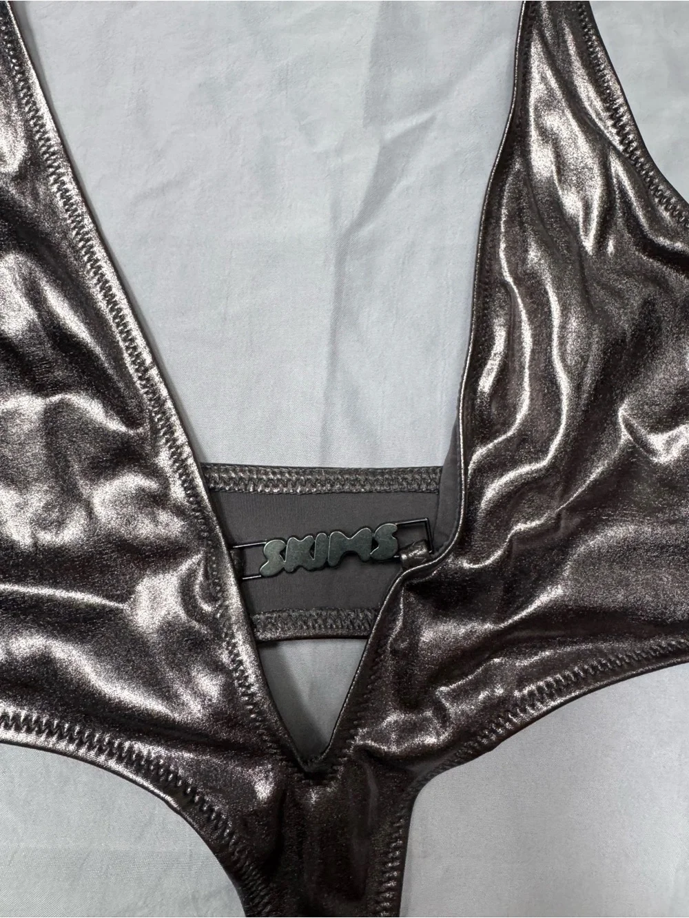 SKIMS Metallic Bronze Cutout Swimsuit